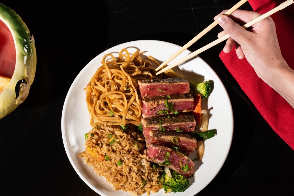 Tuna Tataki on plate with noodles and rice.