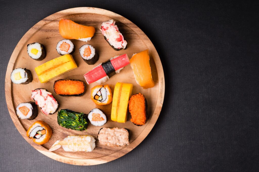A plater of sushi showing the different types of sushi after the origin of sushi