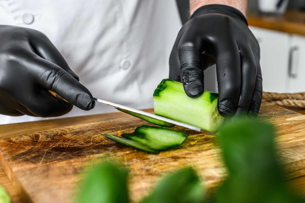 Teppanyaki chef learning to cut vegetables correctly